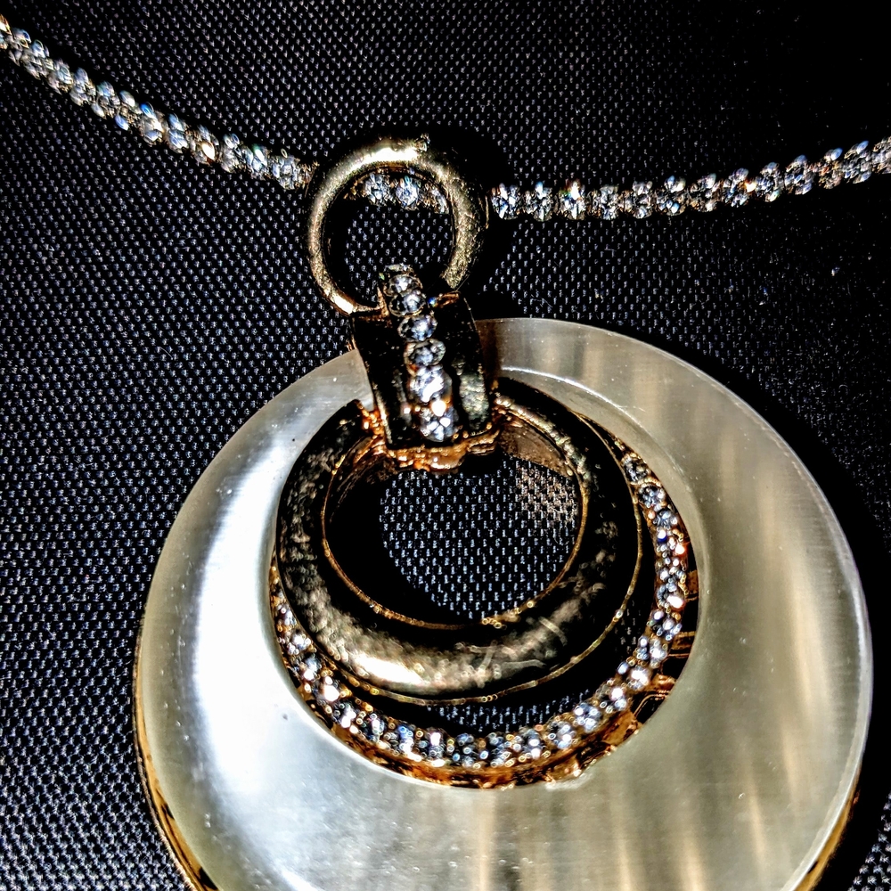 Elegant Gold and Silver Pendant Necklace